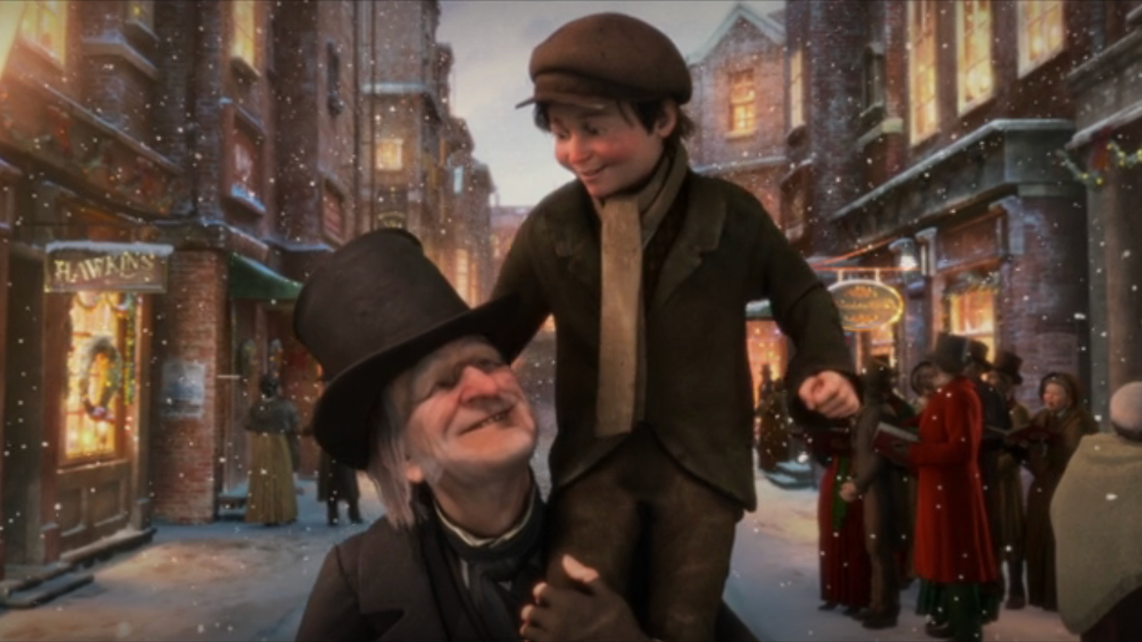Ebenezer Scrooge sourit à Tiny Tim alors qu'il est assis sur son épaule dans le Disney's A Christmas Carol.