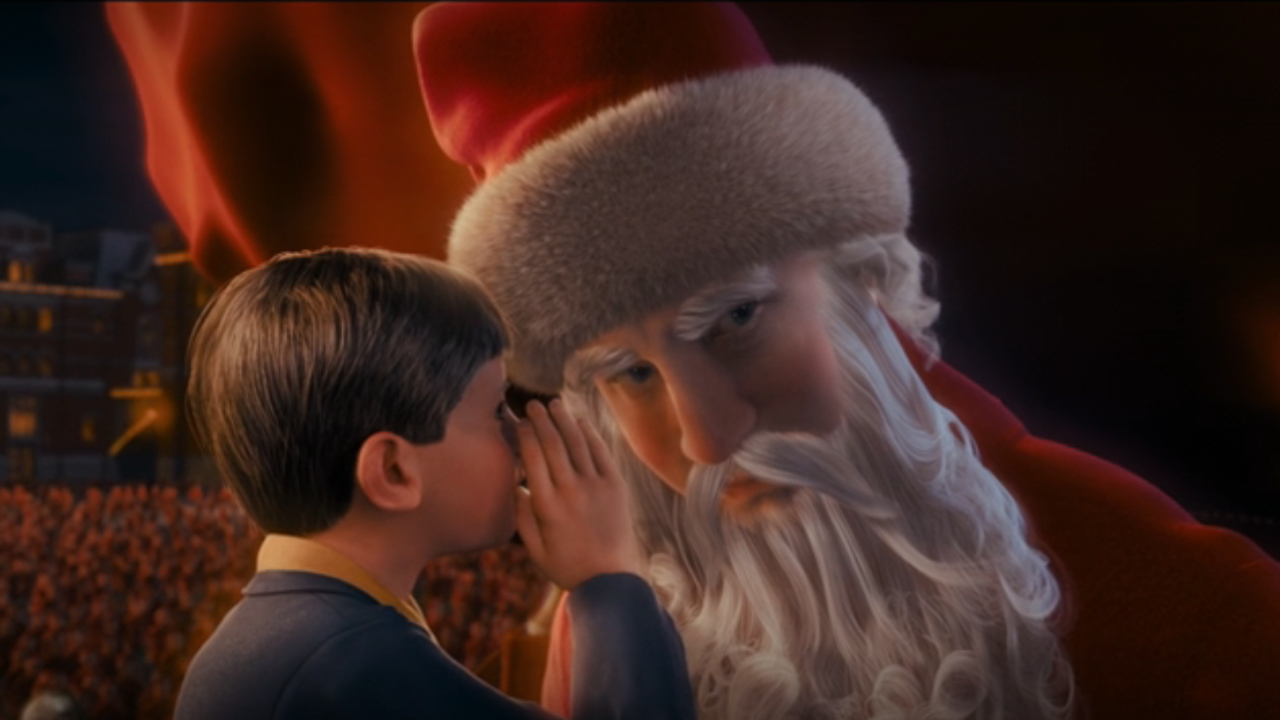 Le héros chuchote à l'oreille de Santa au Pôle Nord dans The Polar Express.