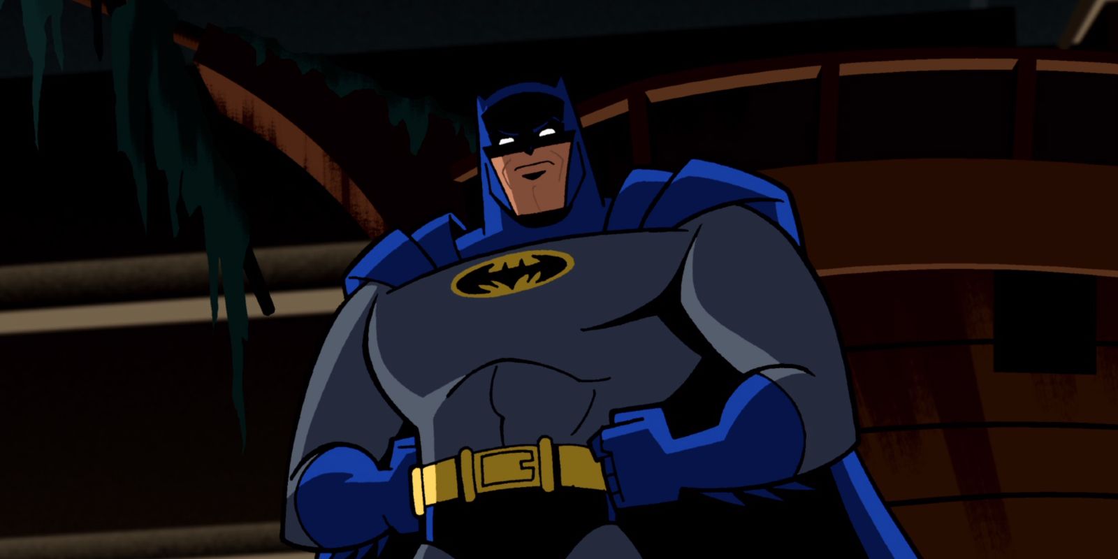 Batman avec les mains sur les hanches dans Batman The Brave And The Bold
