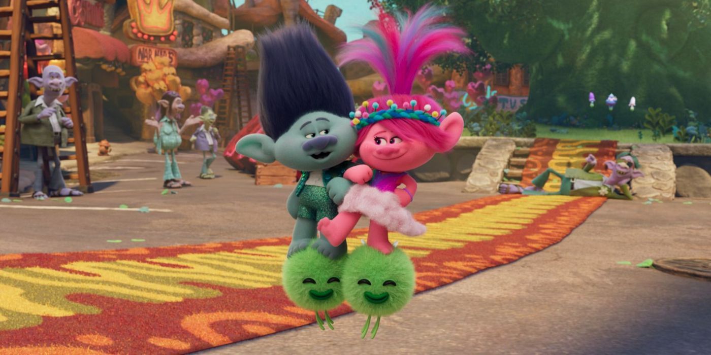 Branch (Justin Timberlake) & Poppy (Anna Kendrick) marchant sur une paire de boules de mousse vertes dans Trolls Band Together
