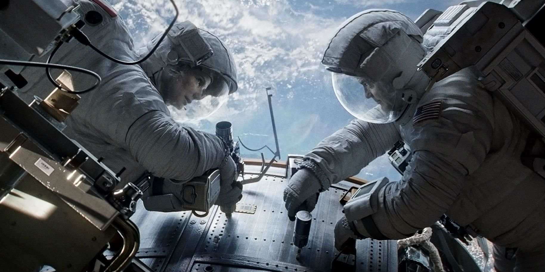 Sandra Bullock et George Clooney dans Gravity