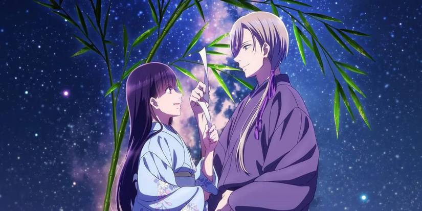 Miyo Saimori et Kiyoka Kudou tenant un rouleau de mariage avec un fond de bambous et étoiles