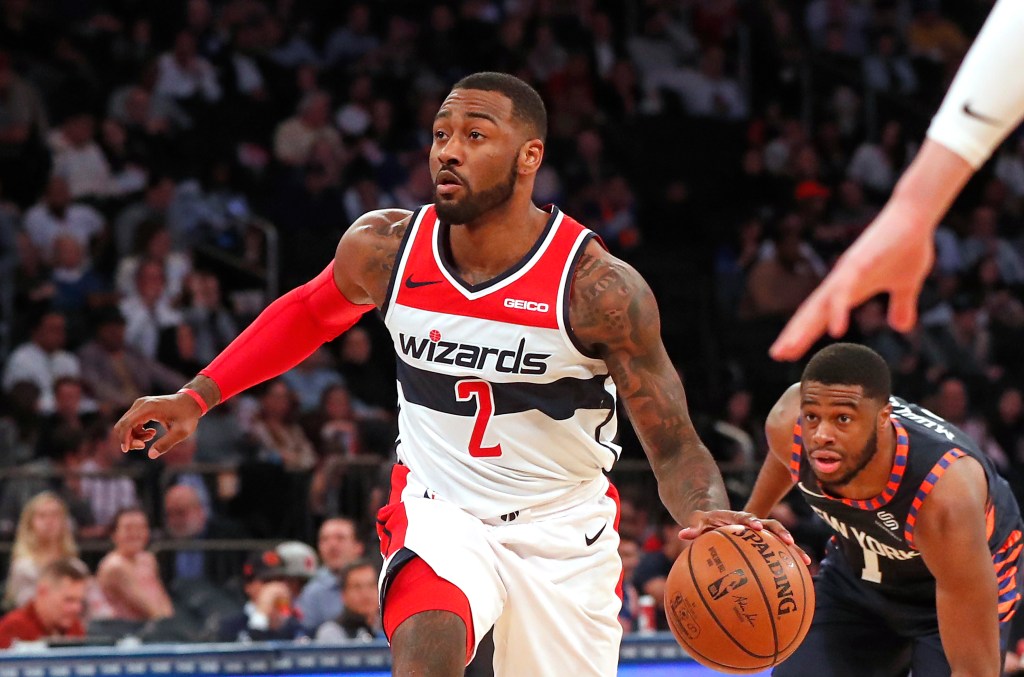John Wall, meneur des Wizards, attaque le panier contre les Knicks.