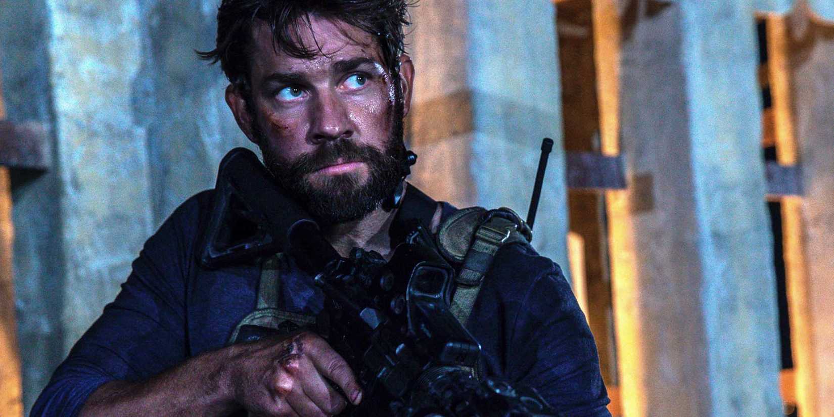 John Krasinski as Jack holds a weapon in Tom Clancy's Jack Ryan