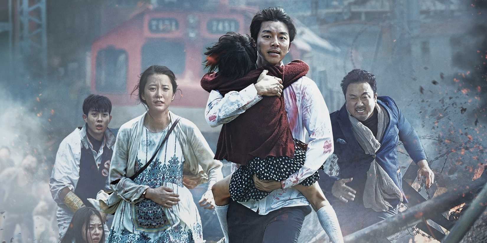 Le personnage de Gong Yoo courant des zombies dans Train to Busan.