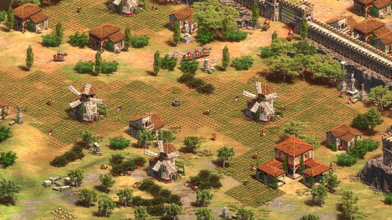 Capture d'écran d'un village fortifié dans Age of Empires II.