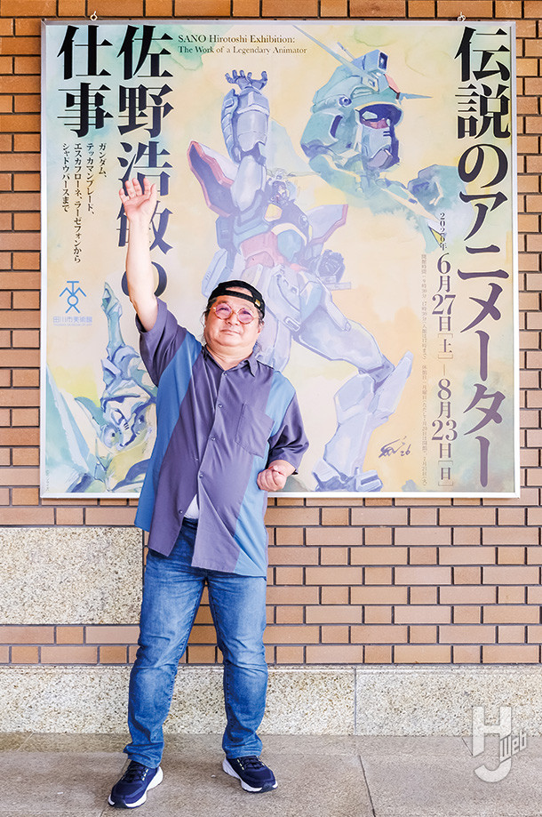 佐野氏と展覧会ポスター