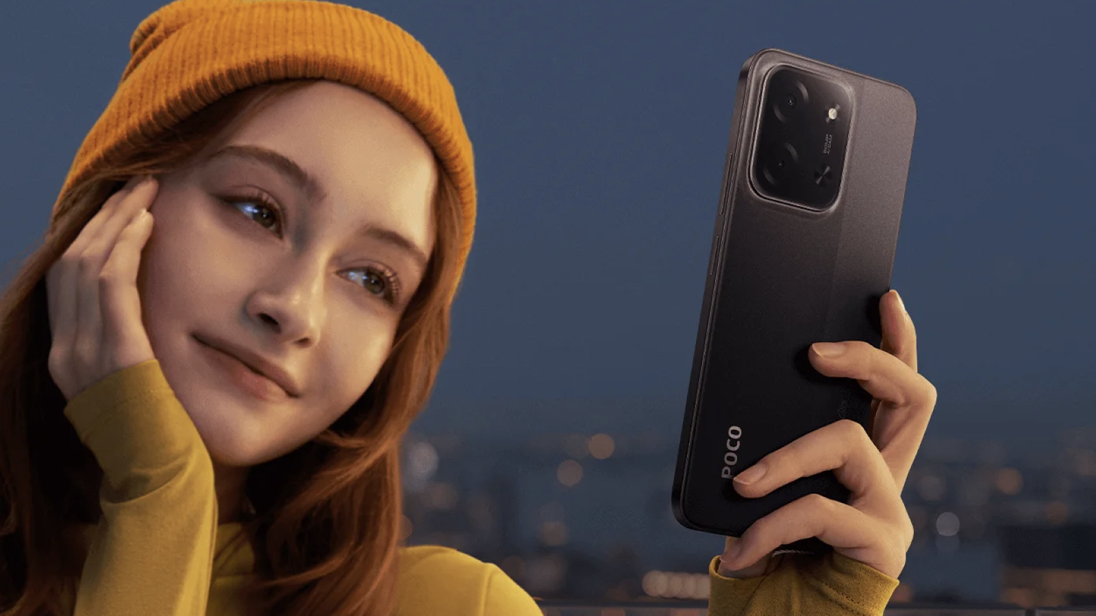 Personne tenant un smartphone POCO C85 en noir.