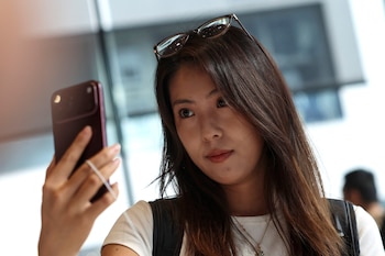 Apple développe la fonctionnalité AutoLock pour sécuriser les iPhones. (REUTERS/Tingshu Wang)