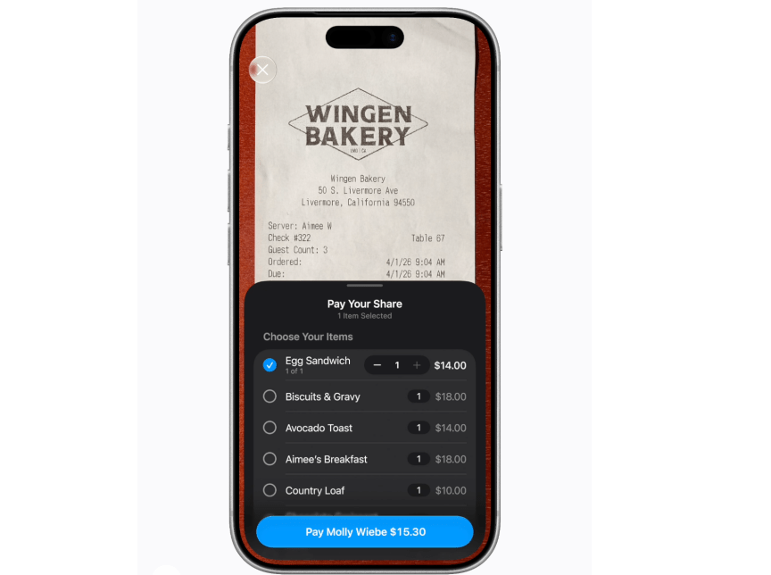 Capture d'écran d'un iPhone montrant un reçu de boulangerie avec l'option de partager l'addition dans l'application Wallet.