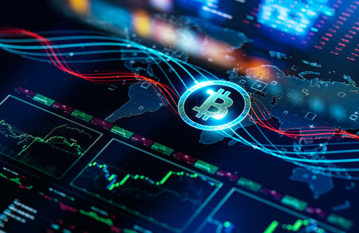 Logo Bitcoin sur un écran numérique.